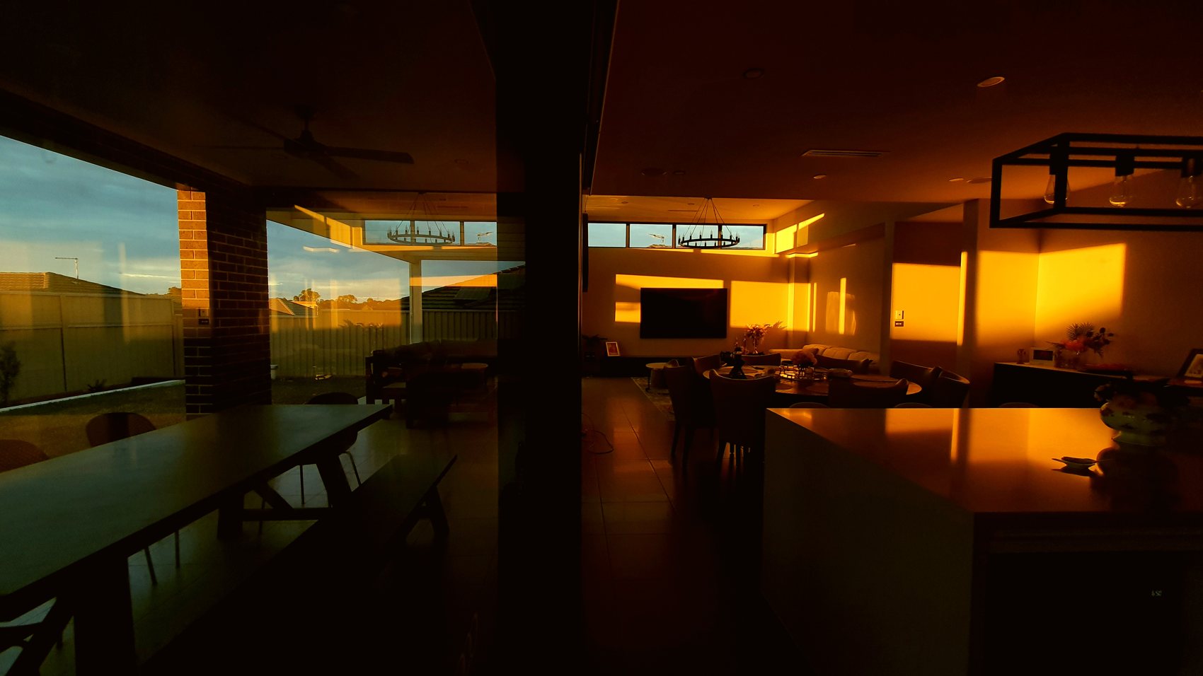 Living and dining space at dusk